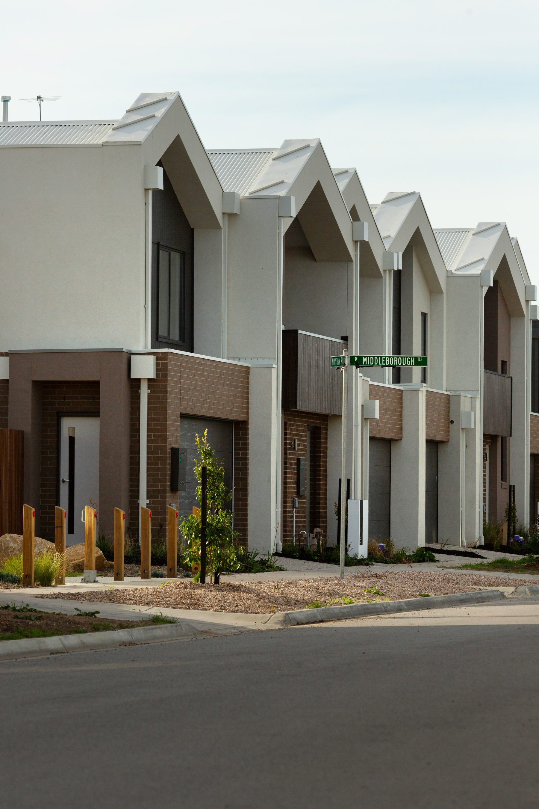 Row of new terrace-style townhouses at Middleborough Terraces development